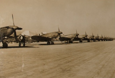 Spitfires lined up on the fields at Tully Hall in Imphal, 15 December 1944 [MB2/N12]