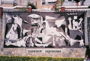 Photograph of a tiled wall in Guernica showing Picasso’s painting, originally produced in response to the bombing of the town during the Spanish Civil War