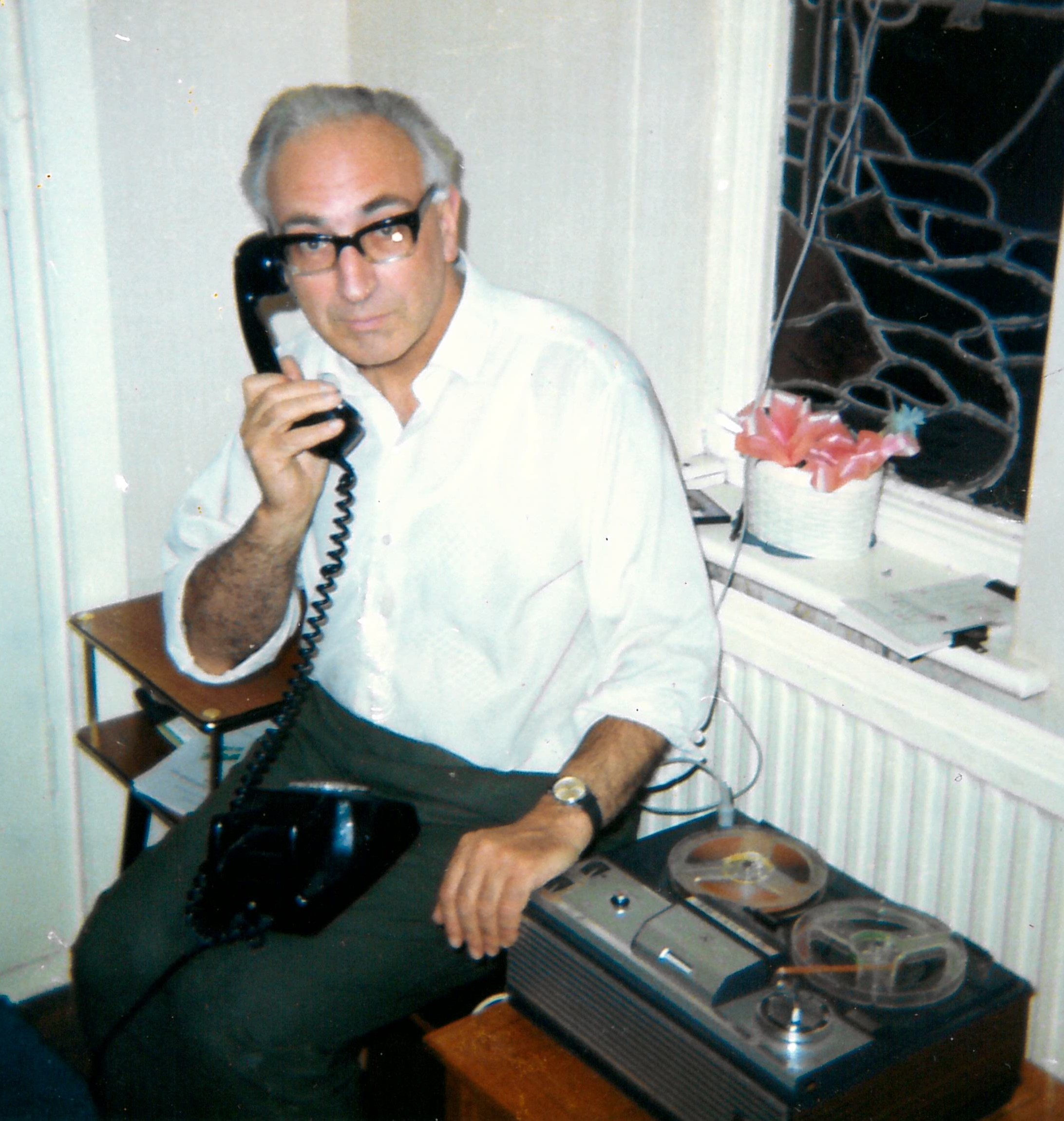 Michael Sherbourne on the telephone with his recording equipment, c.1980s-1990s [MS434 A4249 7/4]