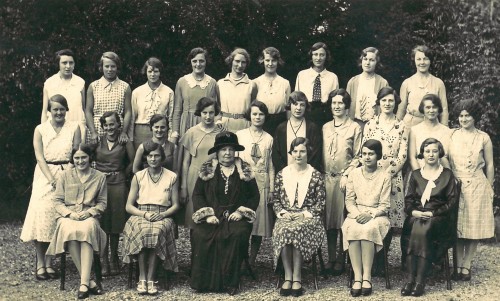 Female residents and sub-warden sat in front of Highfield Hall, 1930-31 [MS 224 A919/1]
