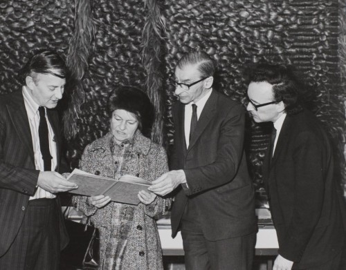 Donald Mitchell, Anna Mahler, Laurence Cecil Bartlett Gower (Vioce-Chancellor), Peter Evans (Professor of Music), looking at a volume from the Mahler Papers, 1973 [MS1/Phot/17/1]